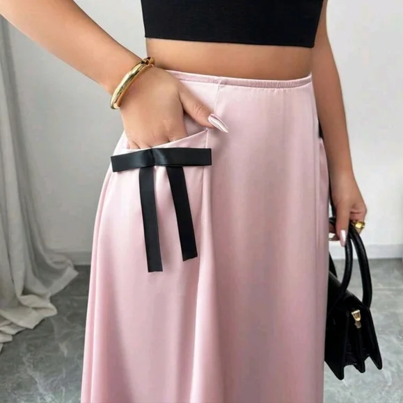 Elegant & Graceful Pink Satin Sheen A-Line Long Skirt With Black Bow Patchwork